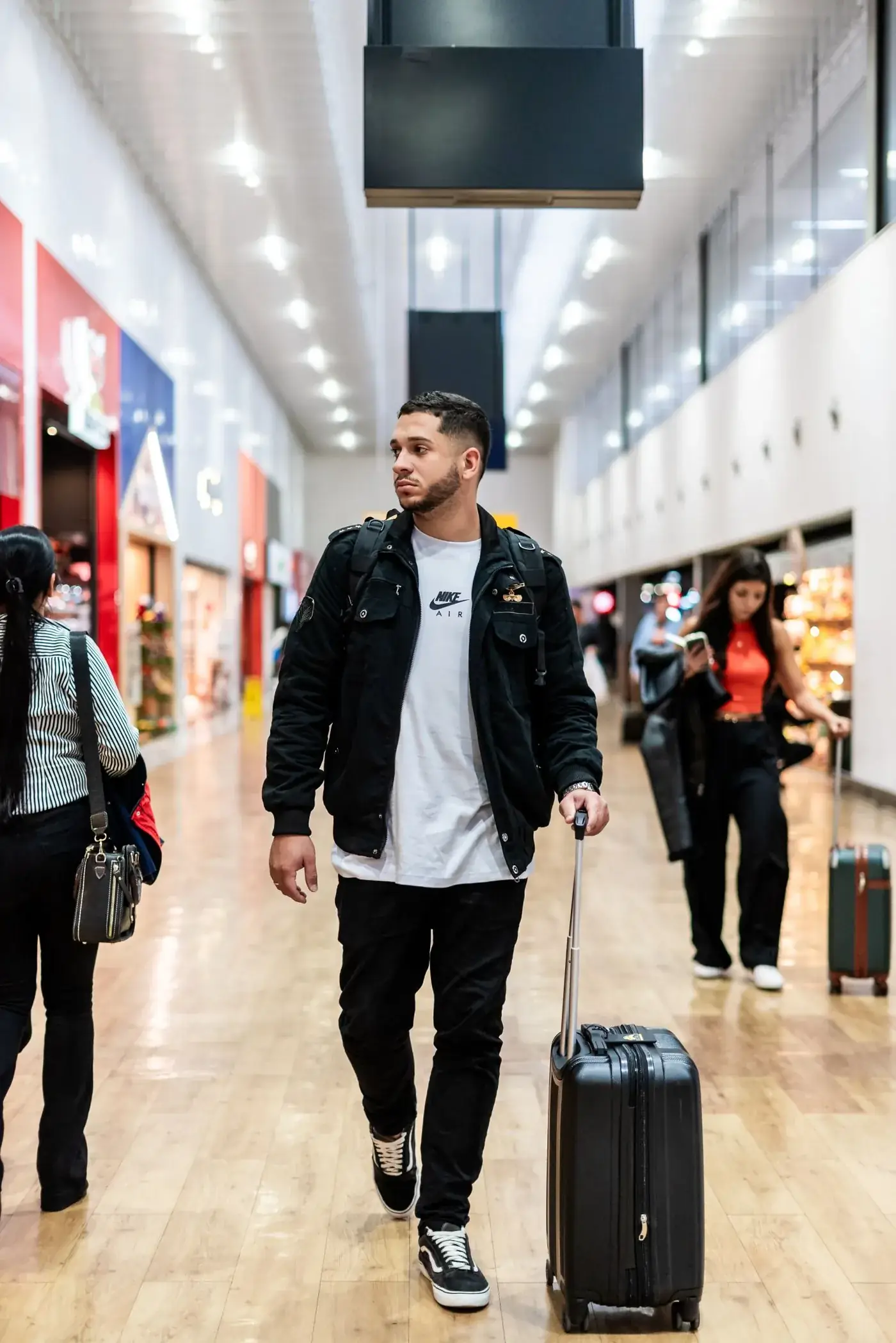 Traveller walking through an airport terminal