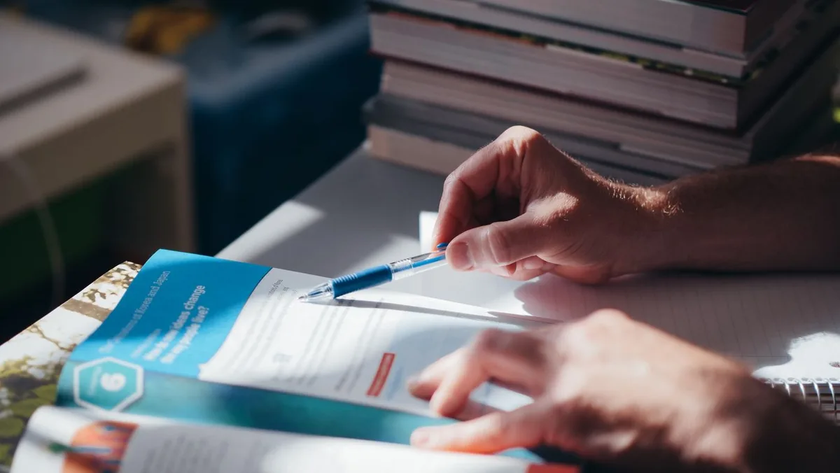 Reviewing case documents at a desk